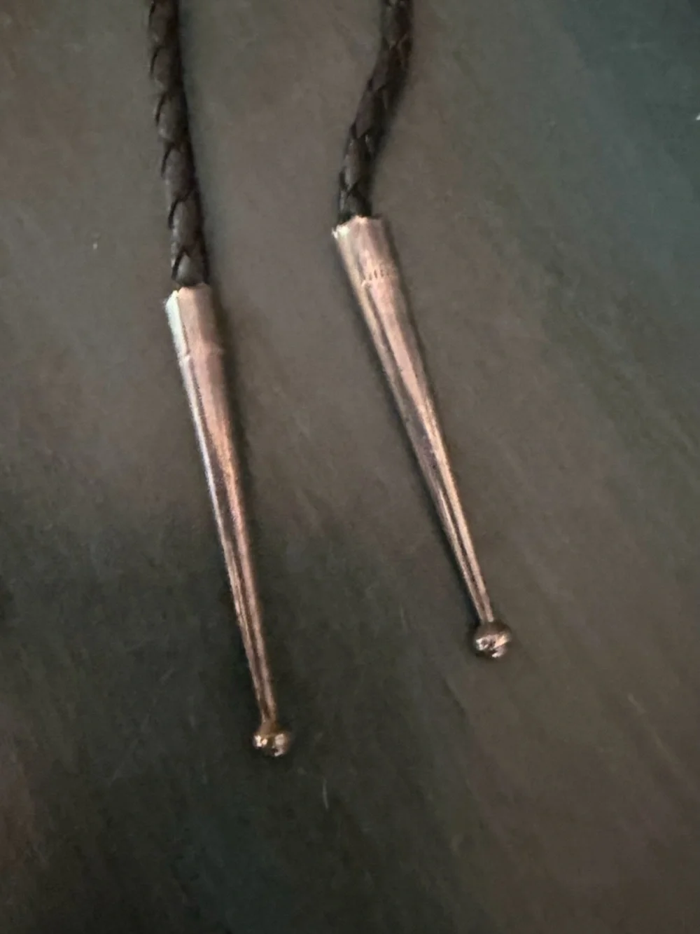 Vintage Bolo with Braided leather cord with silver colored metal tips